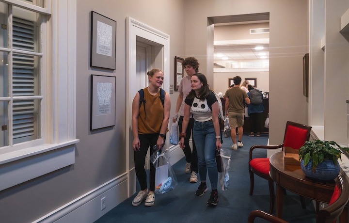 Students walk the halls of the Lyceum during Open Doors.