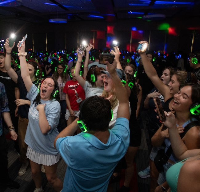 Students dance at silent disco.