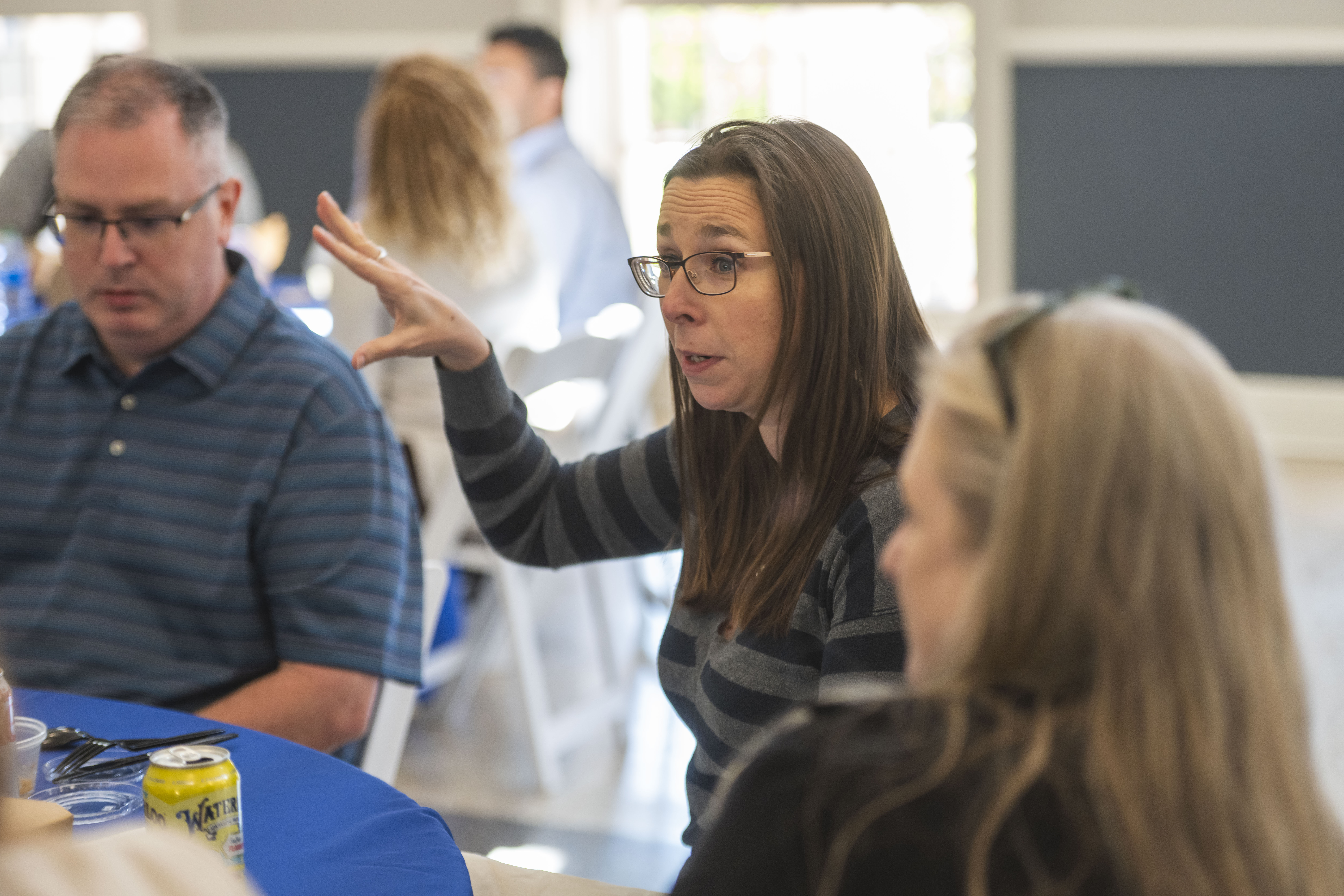 Faculty discuss teaching around a table at a CETL workshop