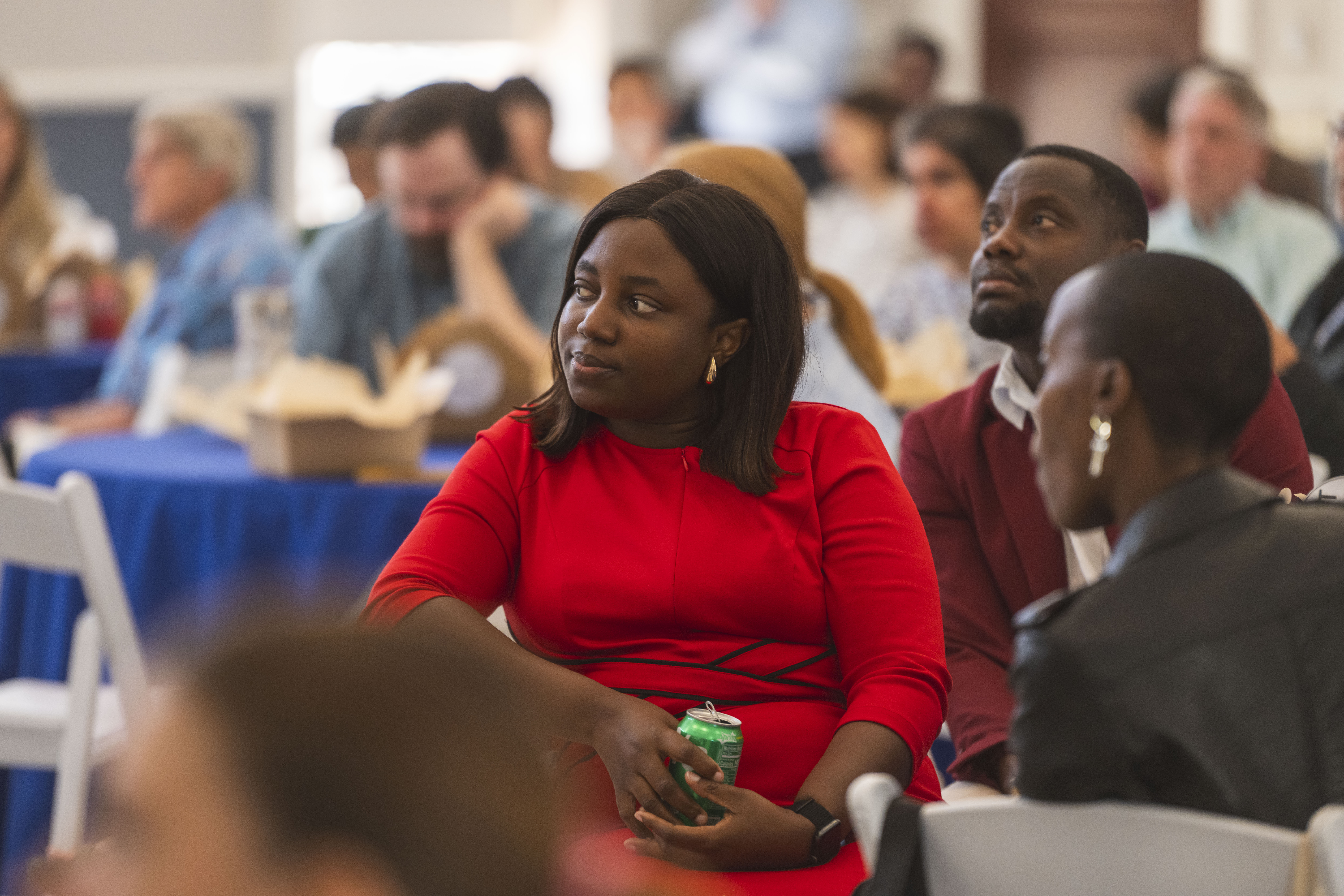 student watching a speaker at a workshop