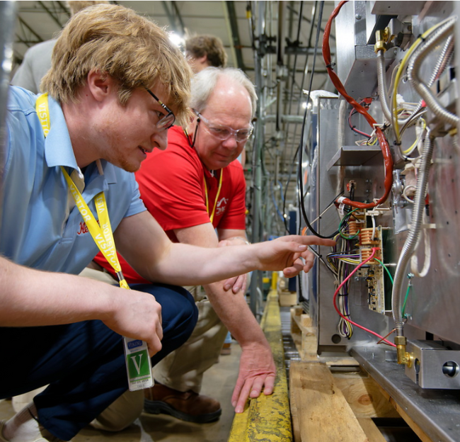 Student working on machine