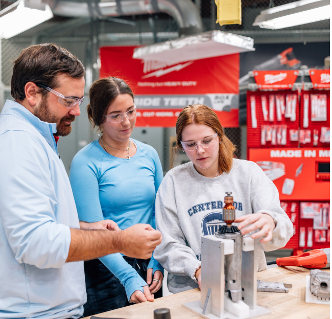 CME student uses equipment on manufacturing floor