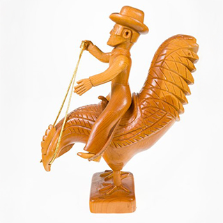 Treated carved pine, gold braid, leather; man in hat sitting on giant, saddled chicken, holding reigh of gold braid in his right hand; chicken has head down, twisted to left, stylized carved pattern; saddle is carved on chicken with leather stirrups added; man is pegged with metal peg to chicken.