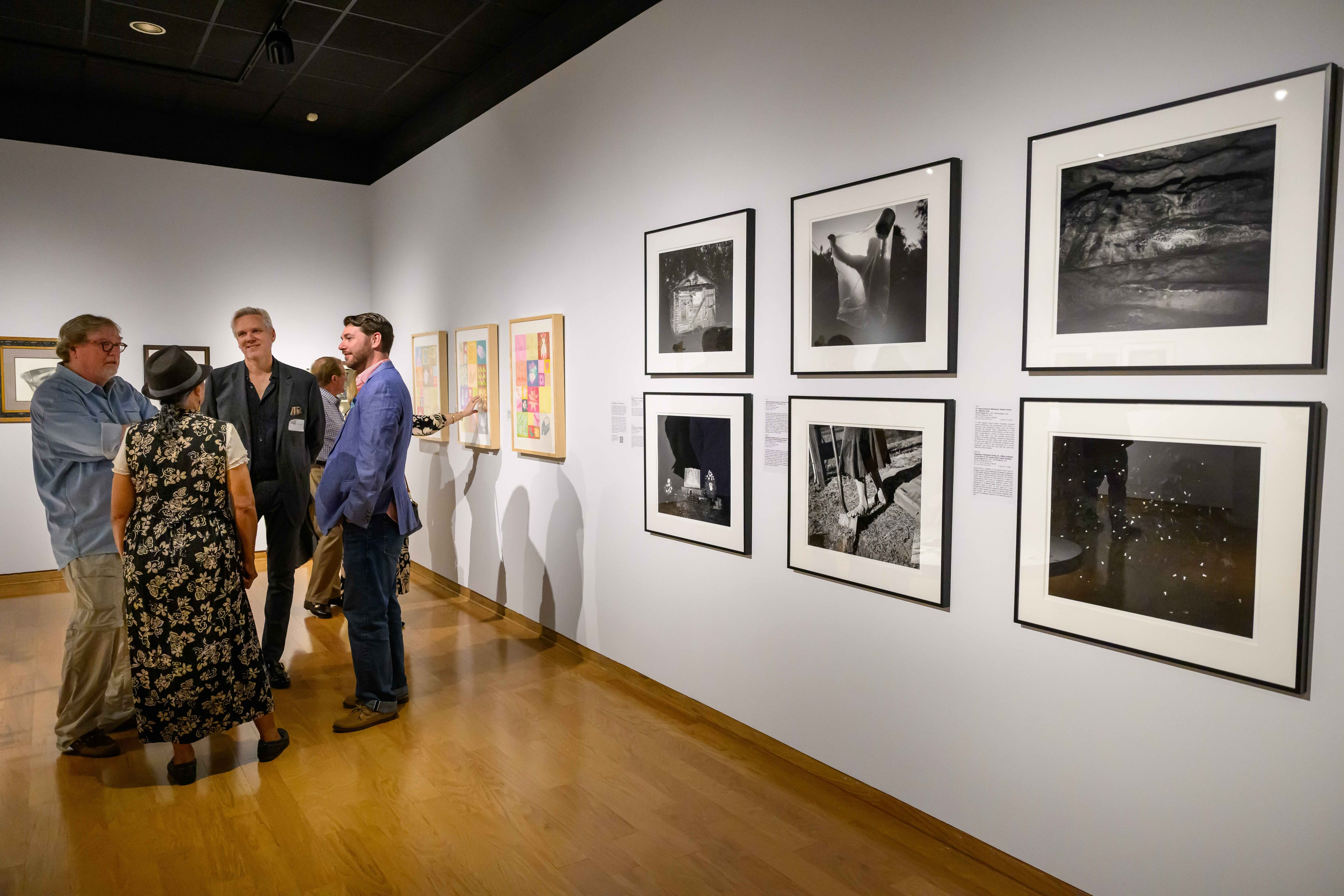 People talking in Art Gallery