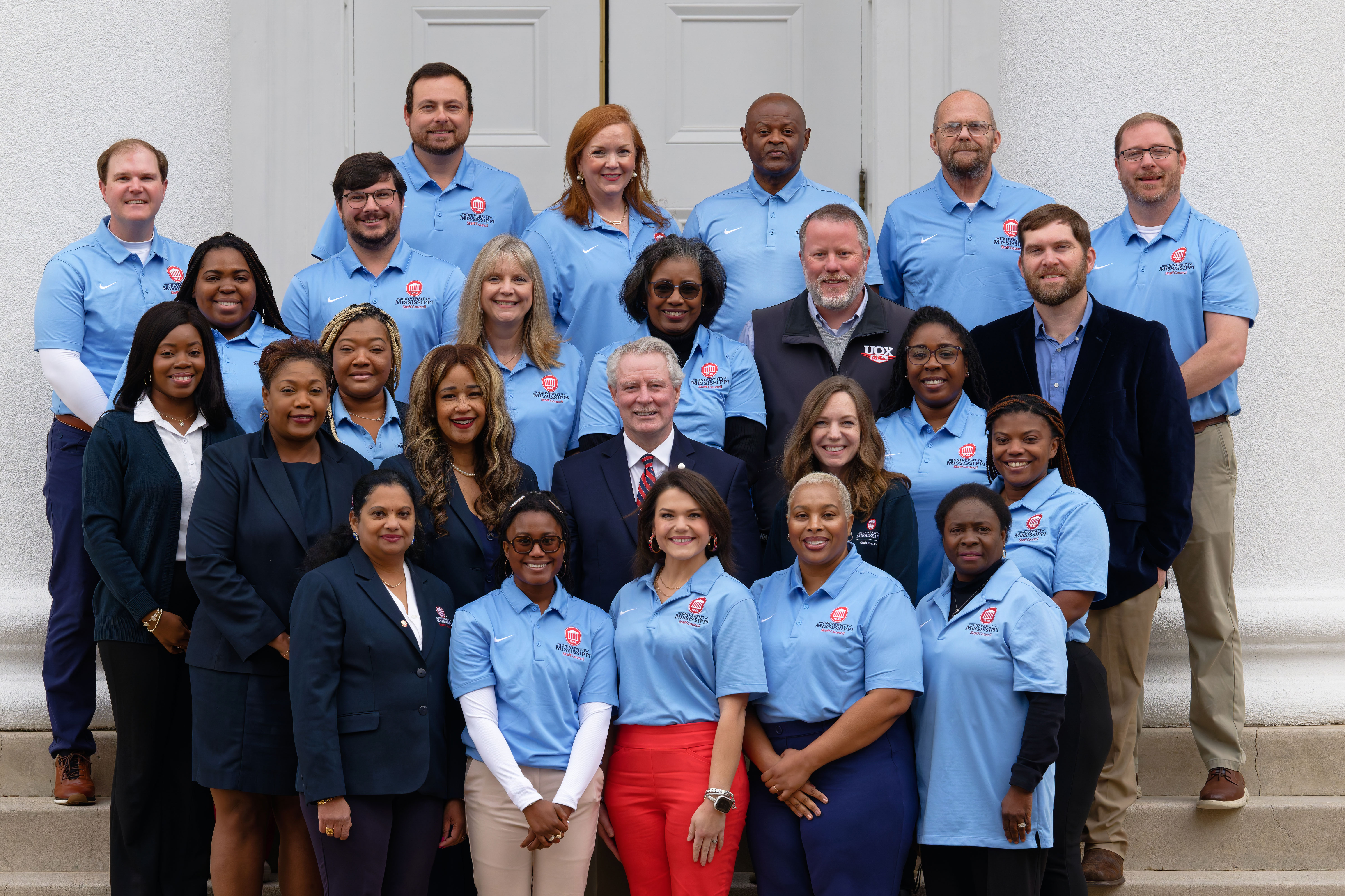 group photo of staff council members with chancellor