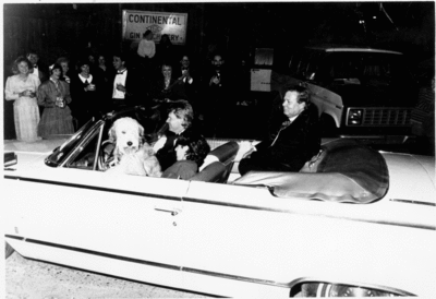 5 inch x 7 inch black and white photograph.  Photograph by Steve Davis.  Willie Morris arriving to the world premier of the Walt Disney film Good Old Boy (1988-11-11) at the Hoka, Oxford, MS.
