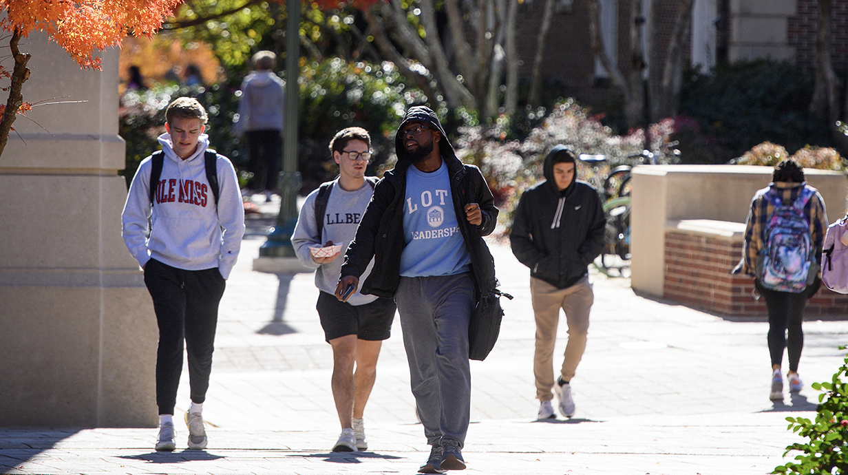 Ole Miss students walking near the library