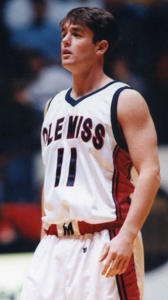 Basketball player standing on a court