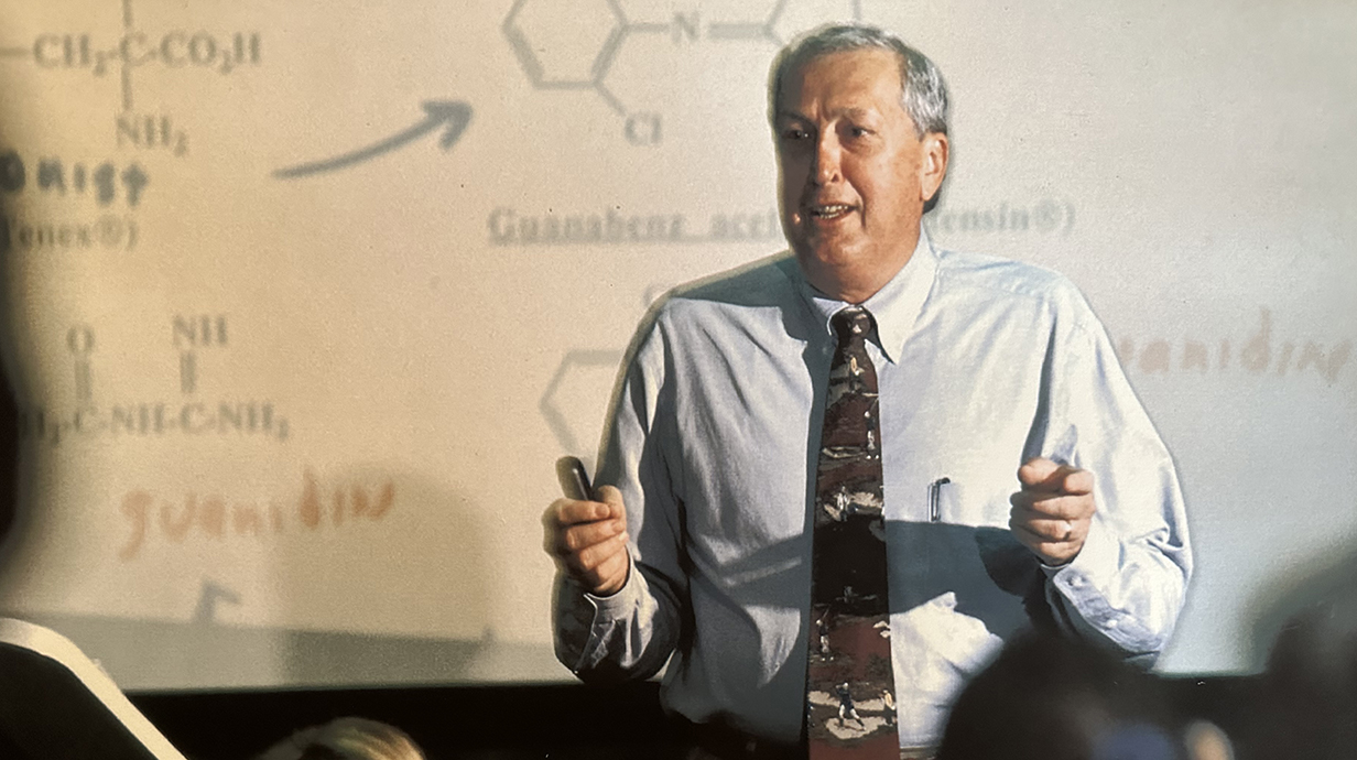 Ron Borne lecturing in a classroom