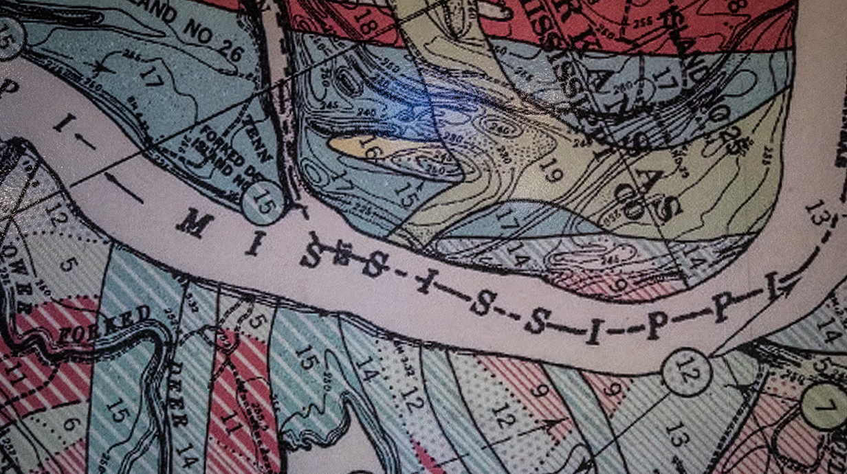 A section of an archival map shows the Mississippi separating parts of Mississippi and Arkansas.