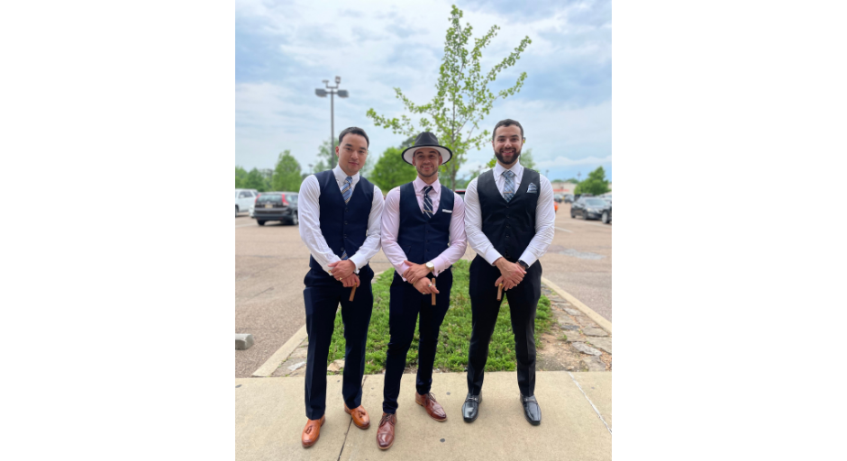 Image of Ahmed Orabi, Christopher Le, and Pedro Cancio posing together after their May 2022 undergraduate graduation.