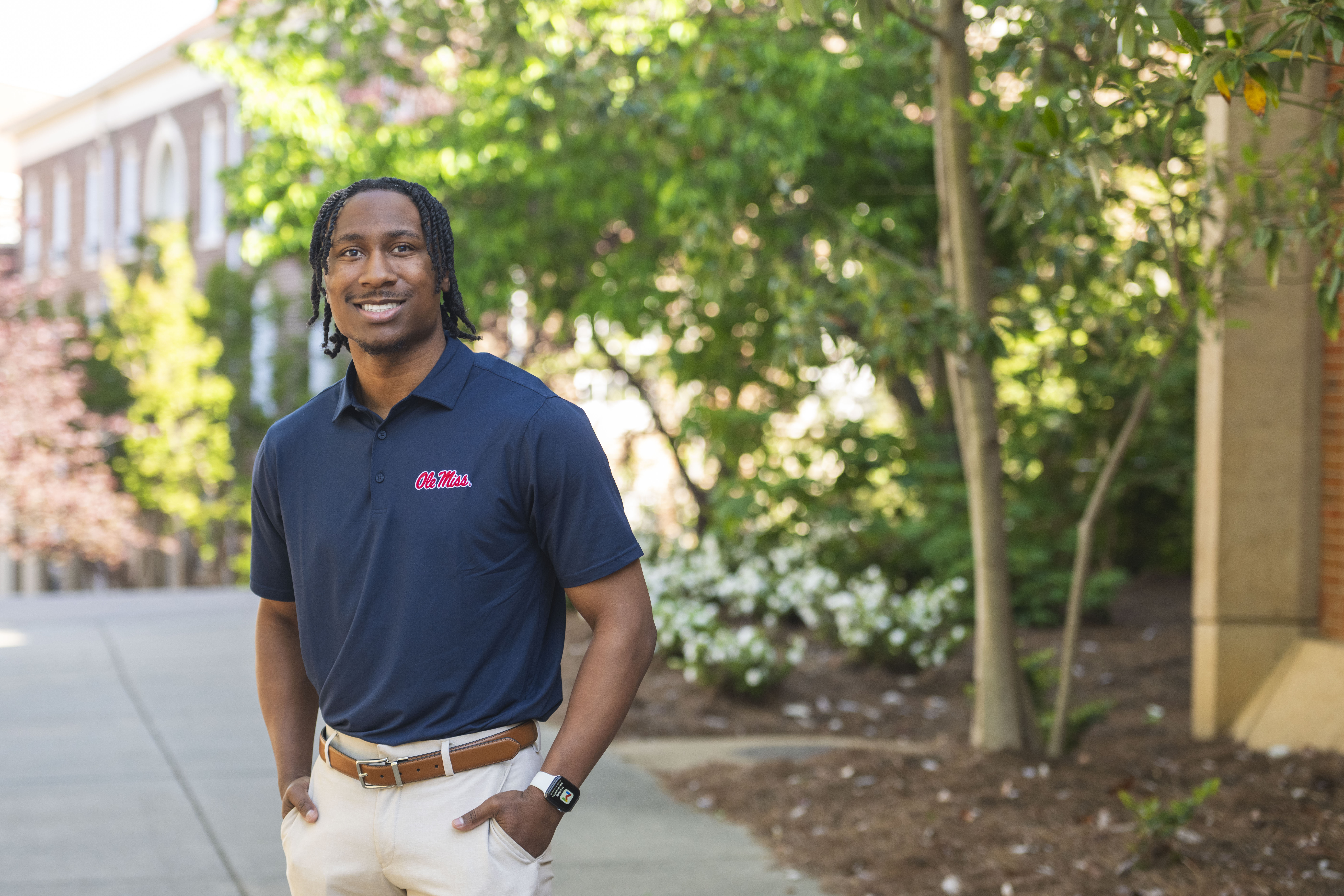 Image of Ja'Ree Myers on campus by some trees.