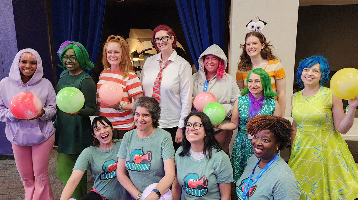 A group of women show off their cosplay for a sci-fi convention.