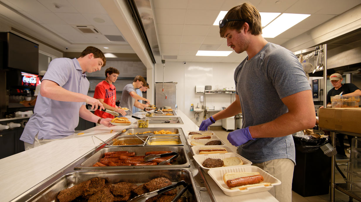 Several Interfraternity Council fraternities created committee within each chapter to safely pack food from their houses four days per week and alert students who opt-in to the Grove to Table alerts when they’ve restocked any of the three designated refrigerators on campus. Photo by Hunt Mercier/Ole Miss Digital Imaging