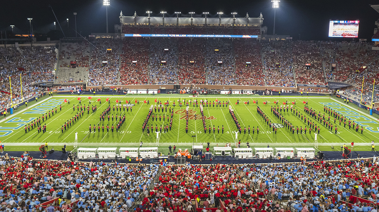 A marching band spells out $1.75 Billion on a football field
