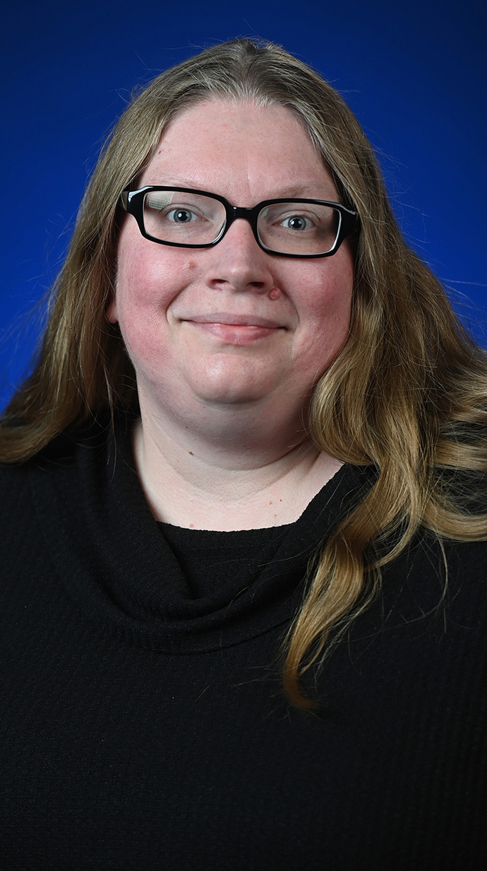 Headshot of a woman wearing a black sweater.