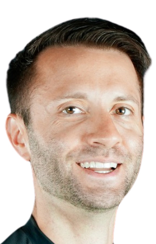 Headshot of a man wearing a black collarless shirt.