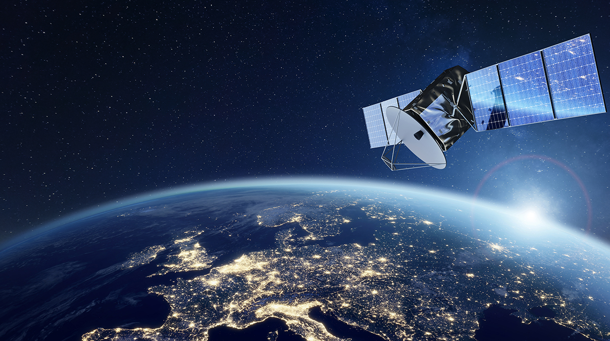 Photo illustration of a satellite orbiting Earth over Europe.