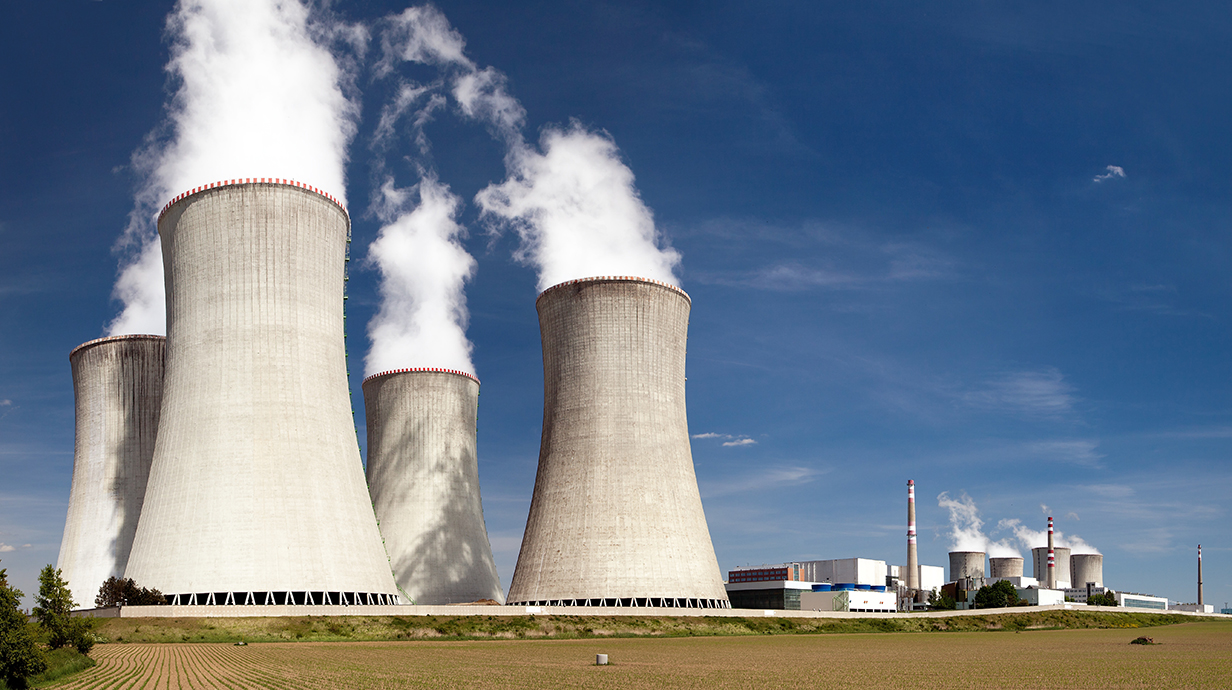Stock photo of cooling towers at a nuclear reactor.