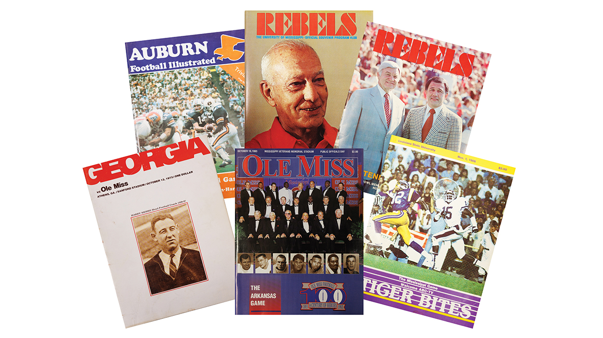 Photo of a collection of programs from Ole Miss football games.