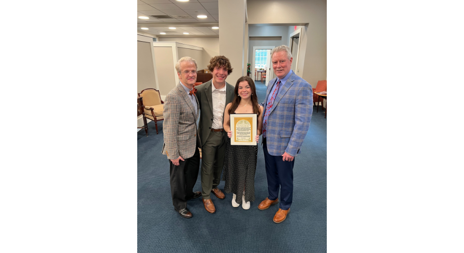 Chancellor Glenn F. Boyce (right) stands with (from left to right) John Carden, assistant professor of musical theatre; Maxwell Glasser and Anna Grace Denny, both theatre arts students. 