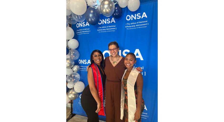 An image of Jilkaih Bryant, Dr. Ibrahim, and Bre'Anna Coleman smiling at the camera while at the ONSA Awards Ceremony.