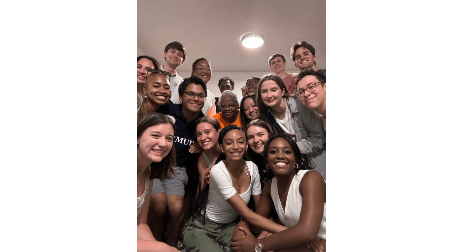 An image of Bre'Anna Coleman and other people smiling at the camera.