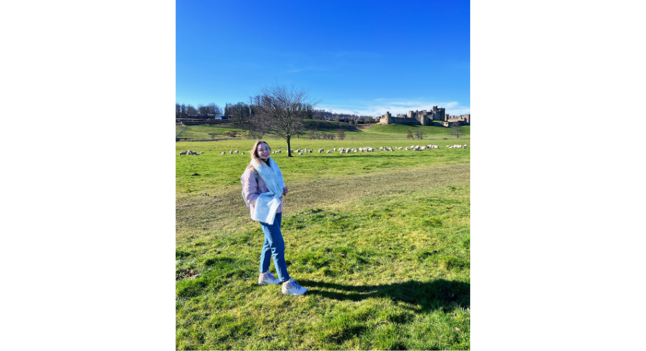 Caroline McCutchen smiles outside of Alnwick Castle in Northumberland, UK.