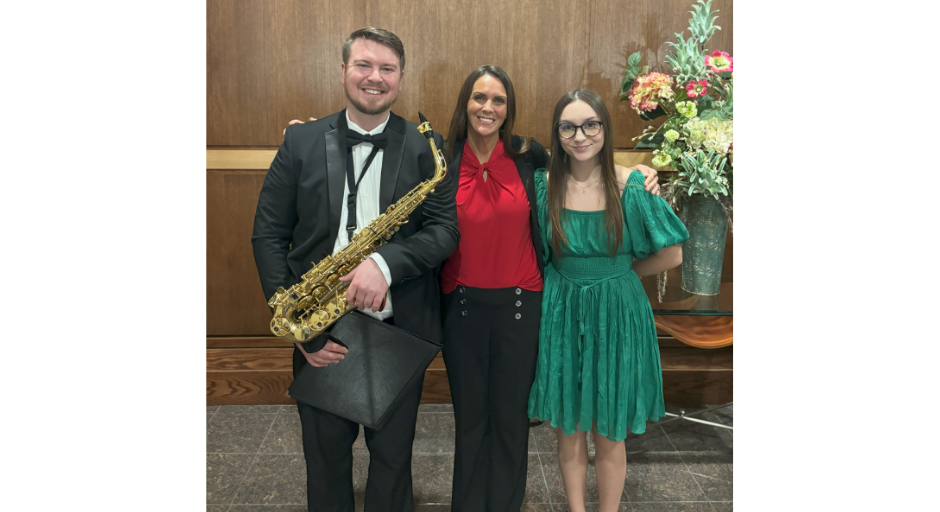 Eric Harper (left) pictured with April Long (middle) and Madison Pruett (right) after a concert performance.