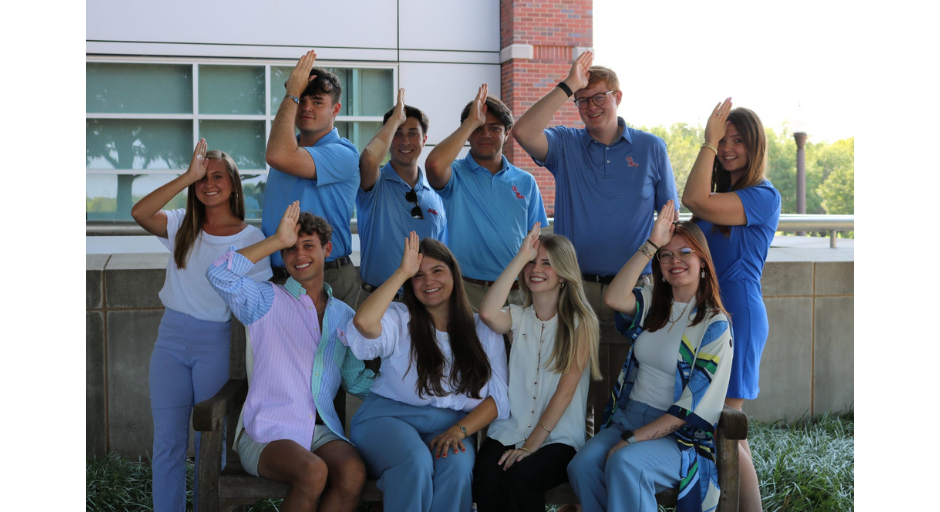 ASB Executive members and advisers pose for a photo at the SEC Exchange conference at Oklahoma University. Pictured are  (back row, left to right) Caleb Ball, Walker Jacklin, Cross Del Tatto, Jack Jones, Haley McGlone (front row, left to right) Ashley Baxter, Braxton Dagg, Hannah Watts, Alex Kipping, and Eva Reynolds. 