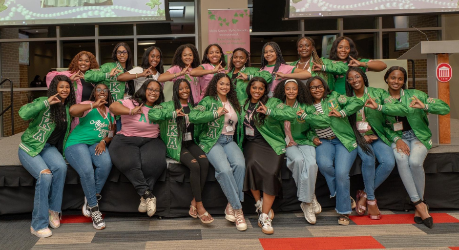 Janelle Minor (back row, right) with her Aka line sisters during the 50th anniversary celebration of the Theta Psi Chapter.