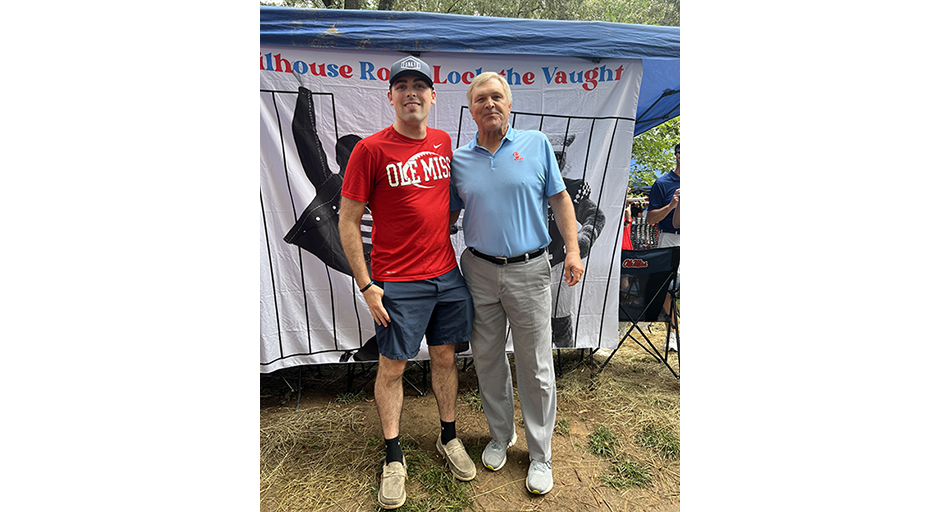 An image of Kyle Wakefield and his dad, Glenn, in the Grove.