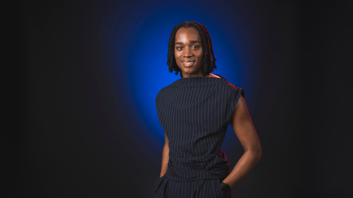 An image of Rod'Kendrick Harrison in front of a blue backdrop.