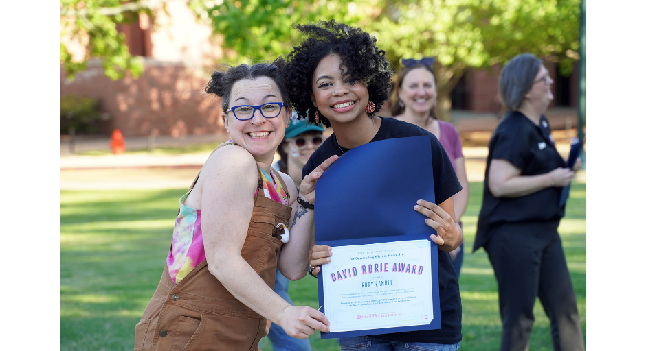 UM art and sculpture professor Stacey Rathert (left) celebrates Rory Randle winning the department’s David Rorie Award, which celebrates one undergraduate’s outstanding spirit and work. 