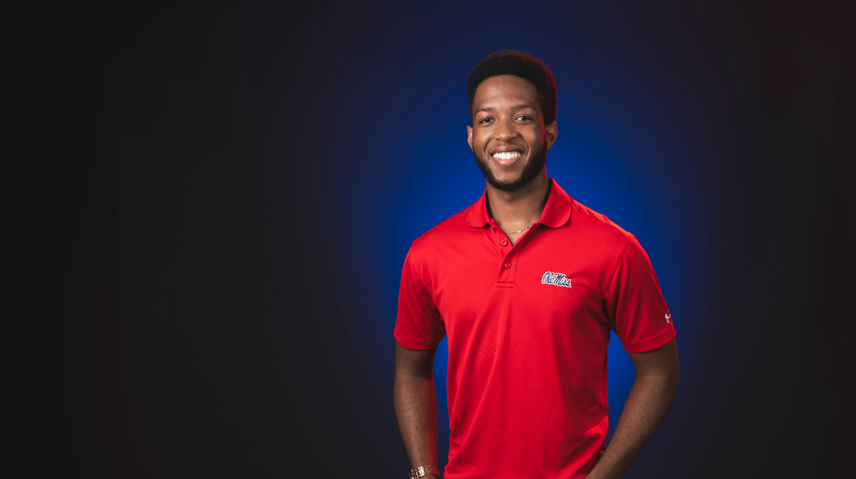 An image of Stuart Fullwood in front of a blue backdrop.