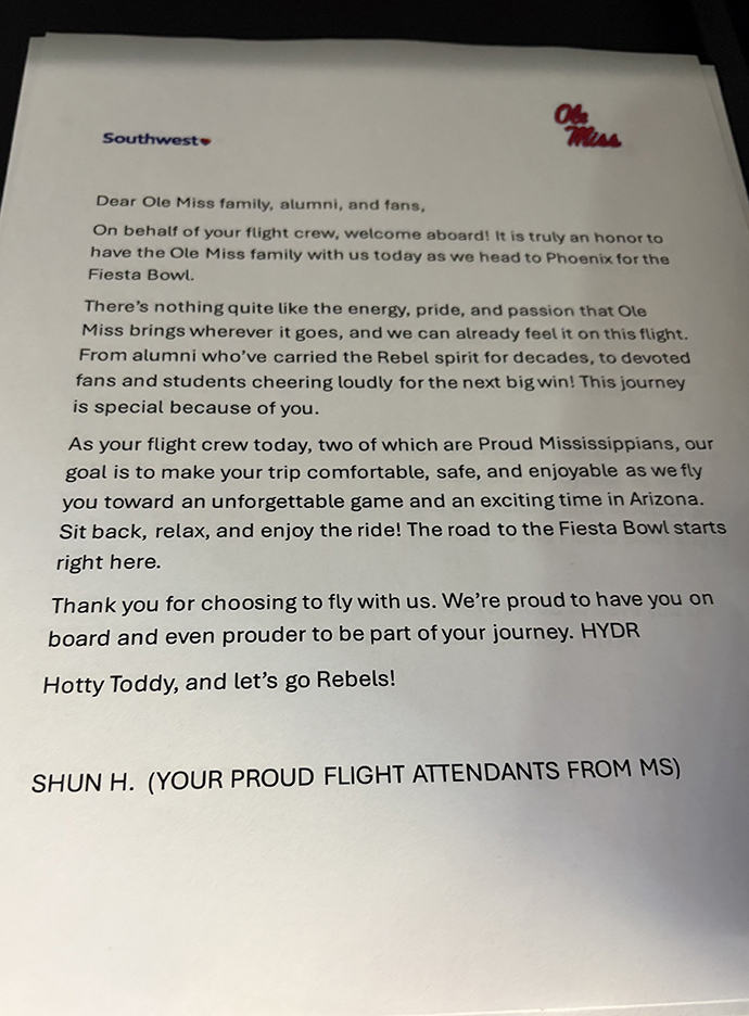 Photograph of a printed letter on Ole Miss letterhead.