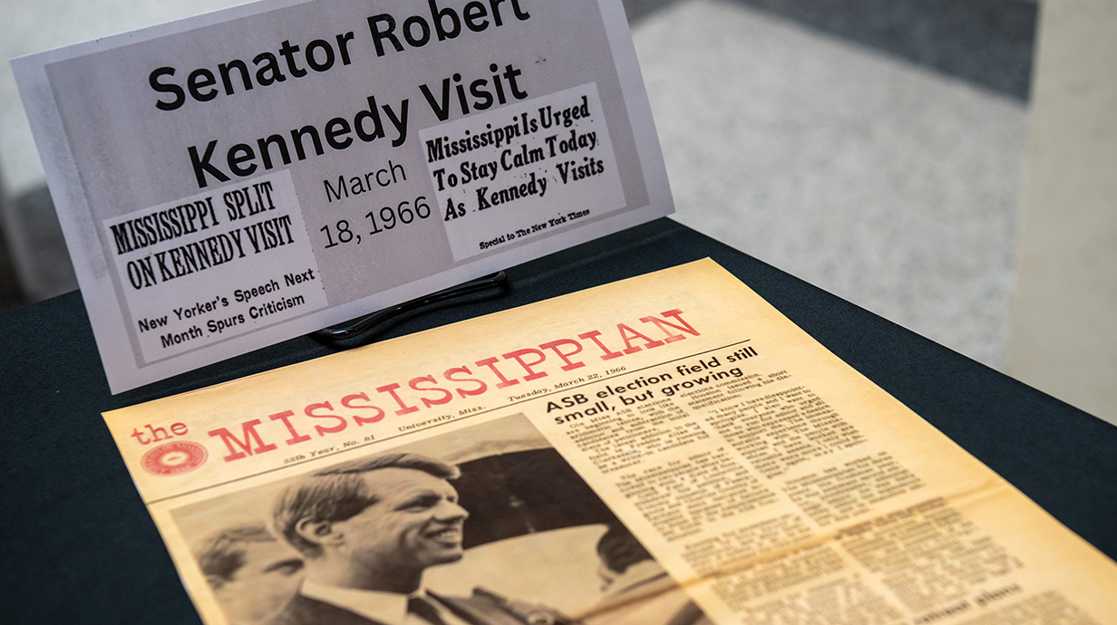 Photo of a newspaper from 1966 with Sen. Robert Kennedy on the front page.