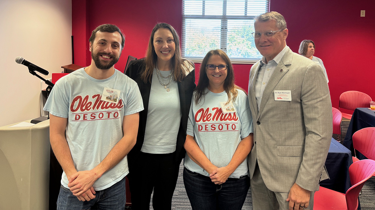 James is pictured with Taylor Hardin, Dr. April Holifield-Scott and Dr. Ryan Niemeyer during Outreach Day.