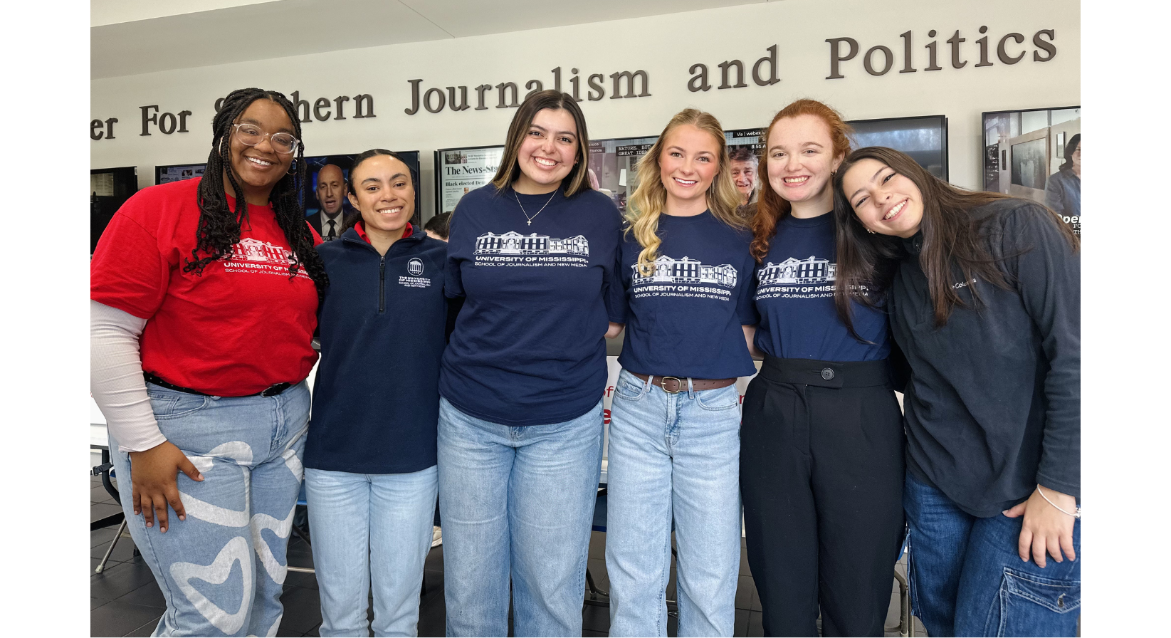 Image of six students smiling for a picture.
