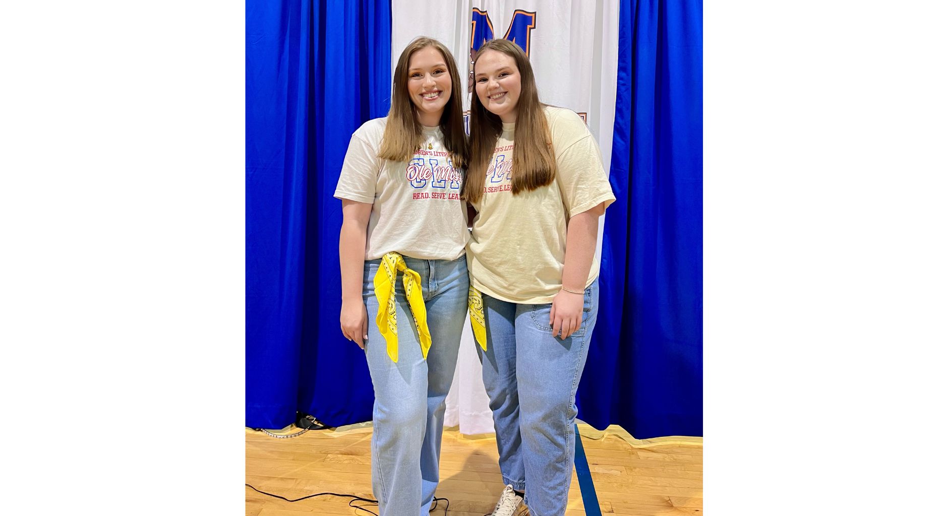 Image of two girls posing for a picture.