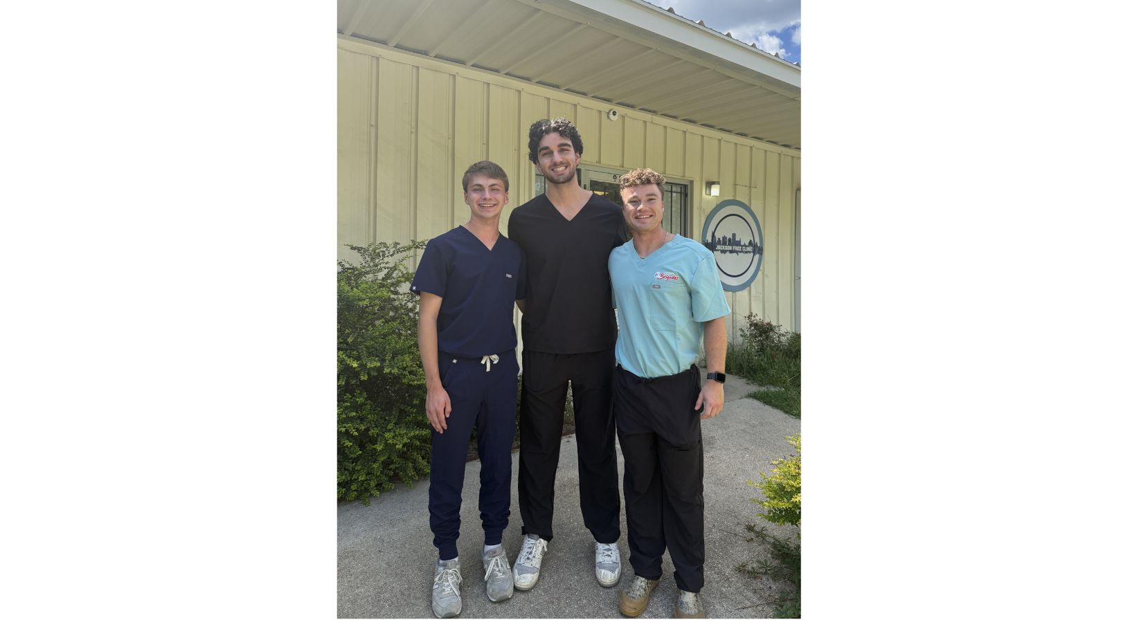Image of Heath Stevens and two friends posing for a picture.