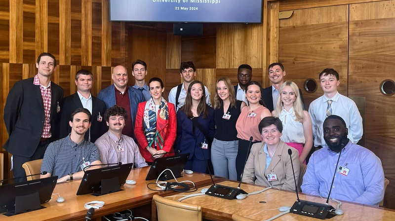 Guntharp takes a photo with others at the United Nations in Geneva.