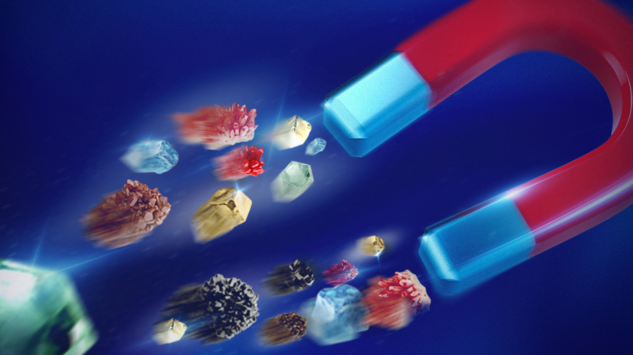 Illustration of a horseshow magnet pulling colorful crystals toward it.