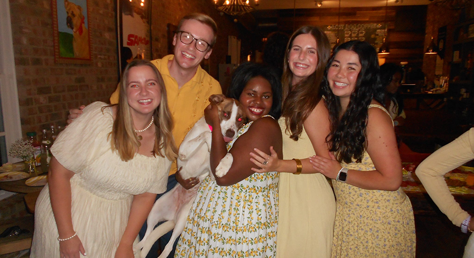 Dymond Mitchell holds her 'foster fail,' a rescue dog named Coco