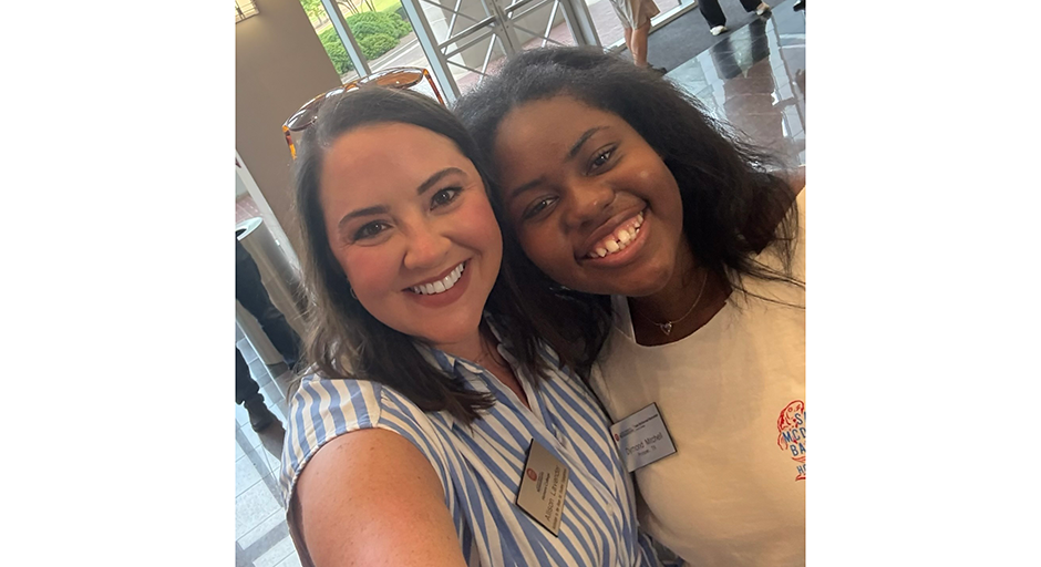 Allison Lavender takes a selfie with Dymond Mitchell. 