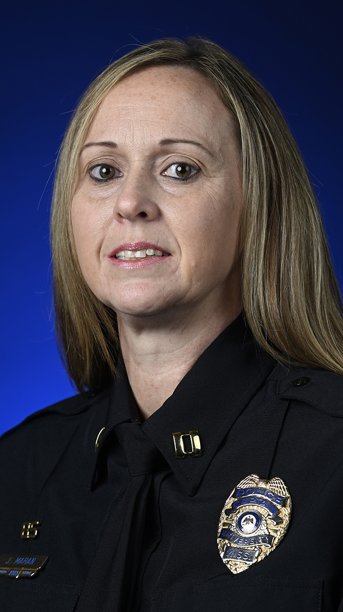Headshot of a woman wearing a police uniform.