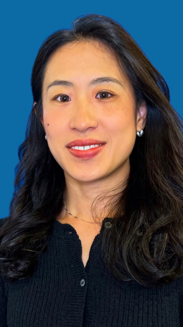 Headshot of a woman wearing a black sweater.