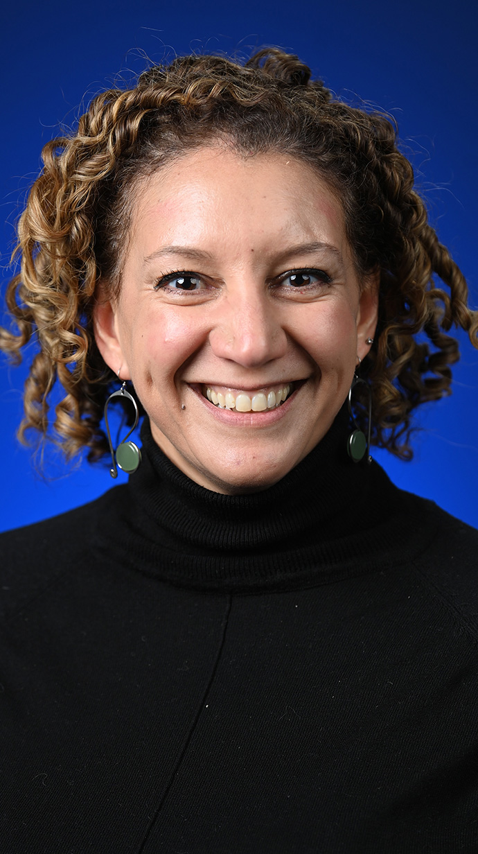 Headshot of a woman wearing a black sweater.