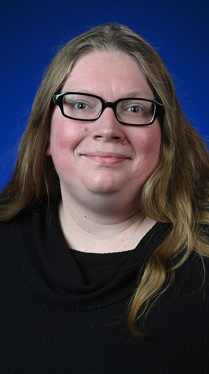 Headshot of a woman wearing a black sweater.