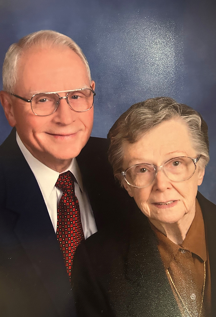 Photo portrait of an an older man and woman.